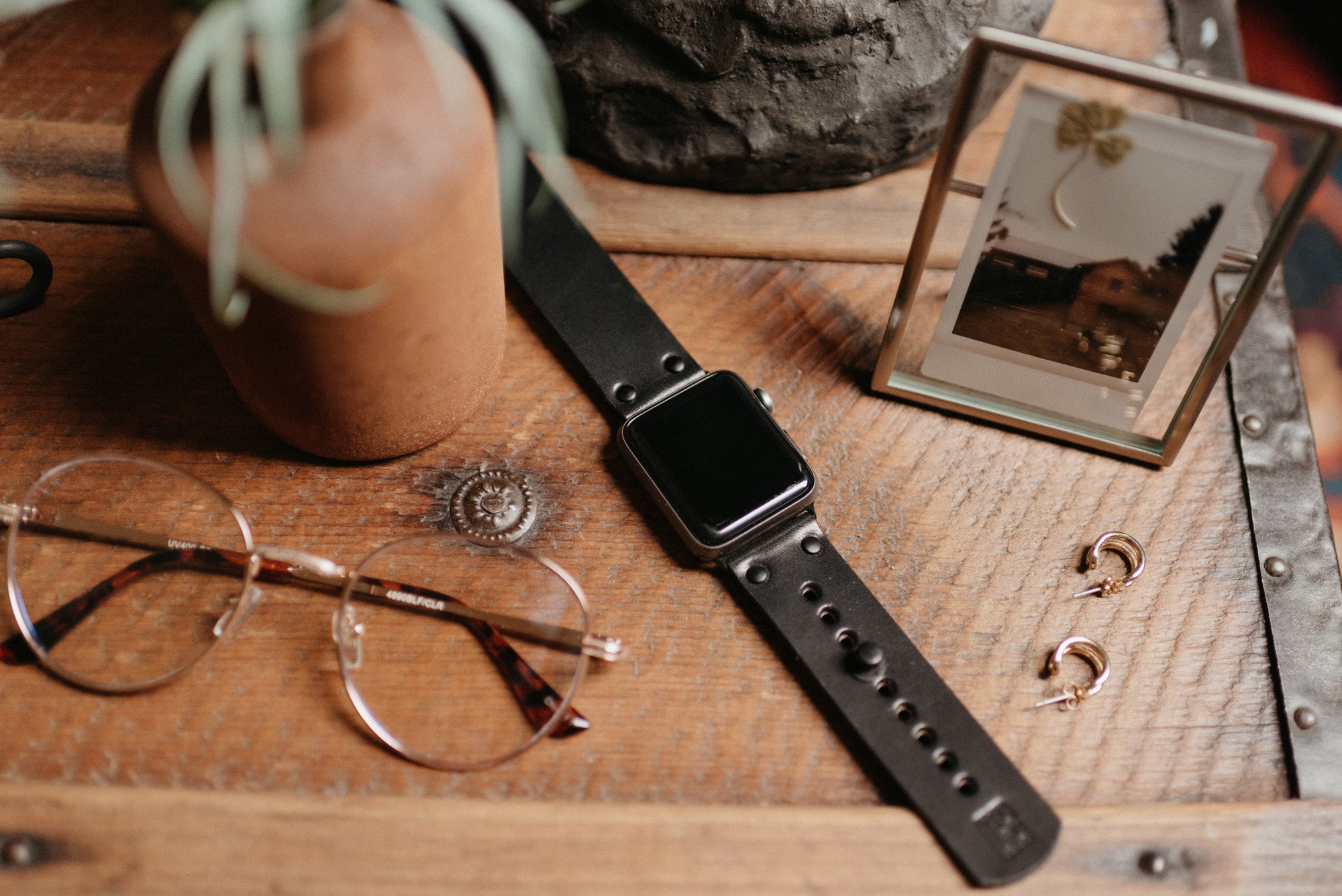 Apple Watch band in black full-grain leather with button stud closure