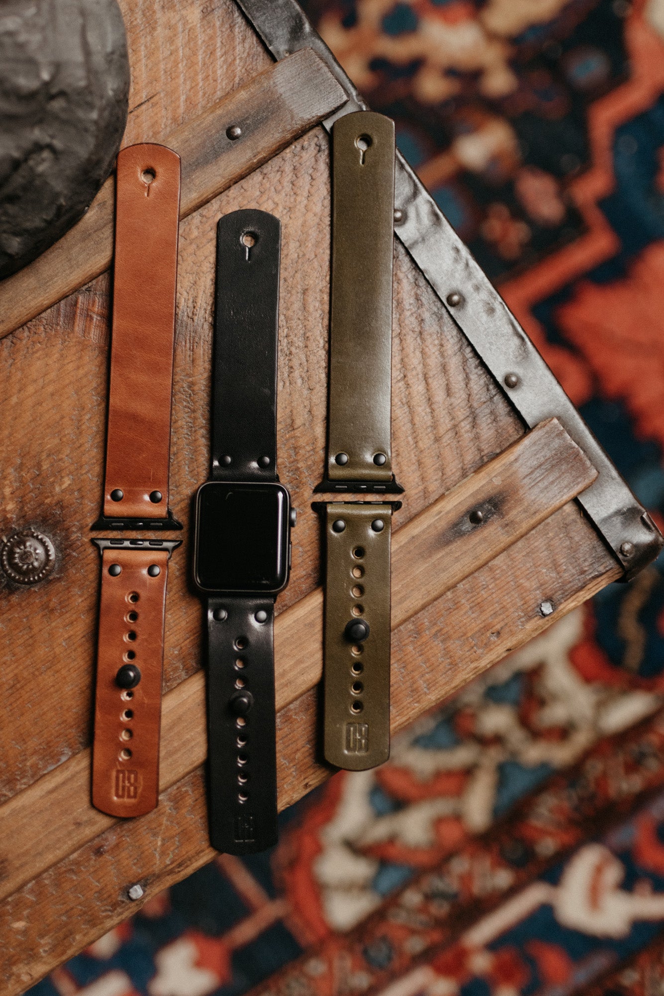 Apple Watch band in black full-grain leather with button stud closure