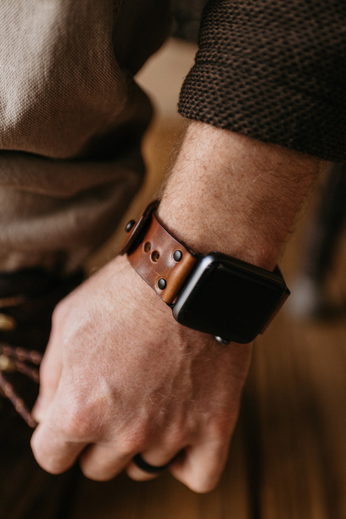Apple Watch band in buck brown full-grain leather with button stud closure