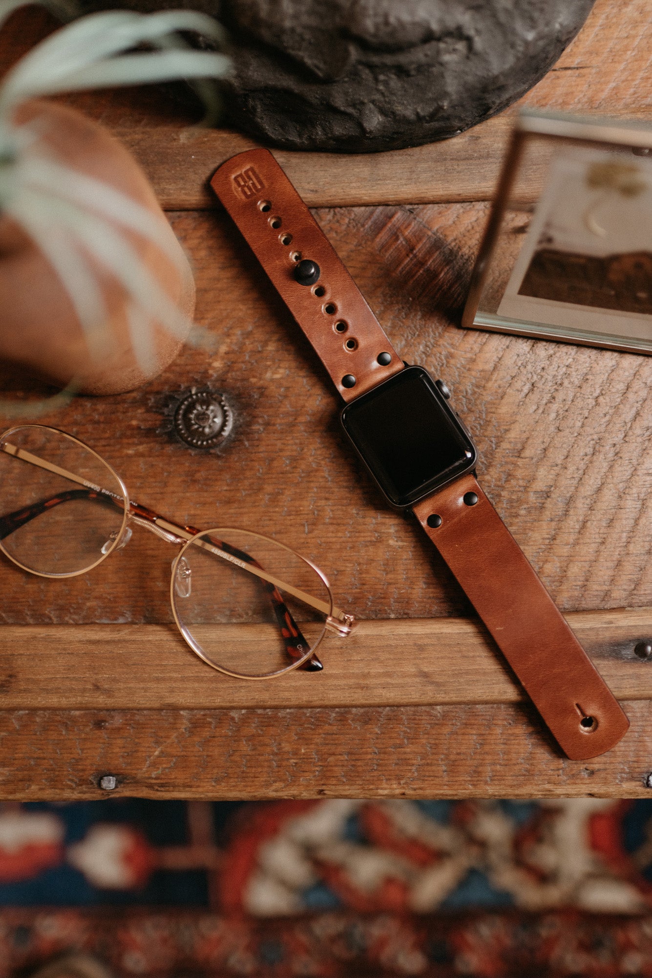 Apple Watch band in buck brown full-grain leather with button stud closure