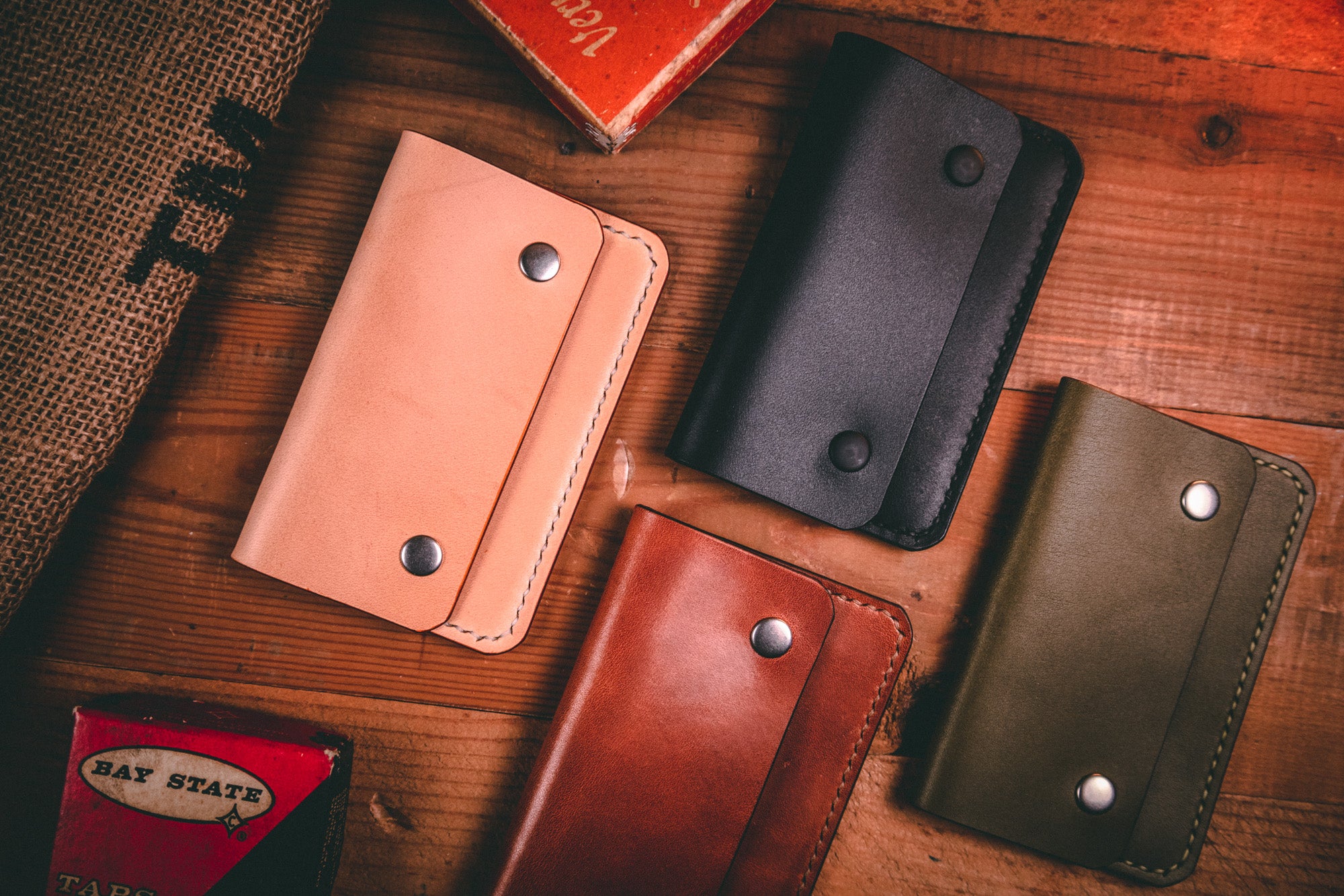 Slim card wallet in natural harness leather with solid brass snap