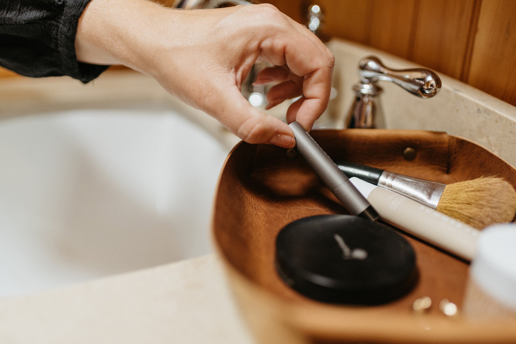 Full-grain leather butler tray holding keys, wallet and everyday carry