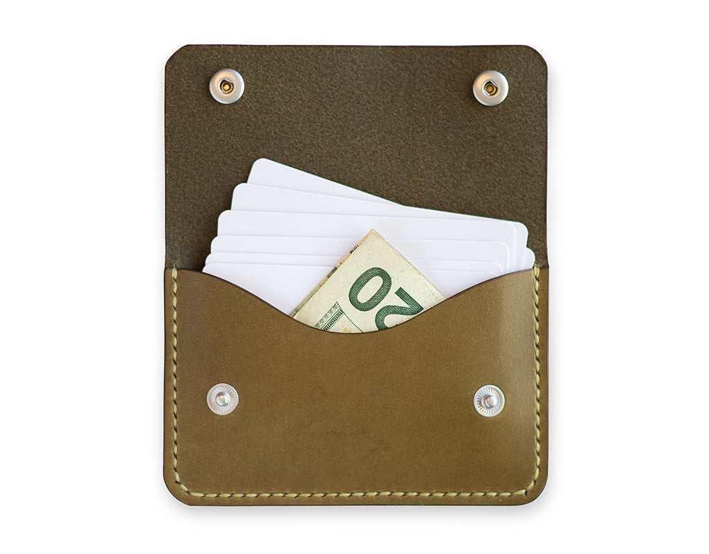 Slim card wallet in olive harness leather with solid brass snap